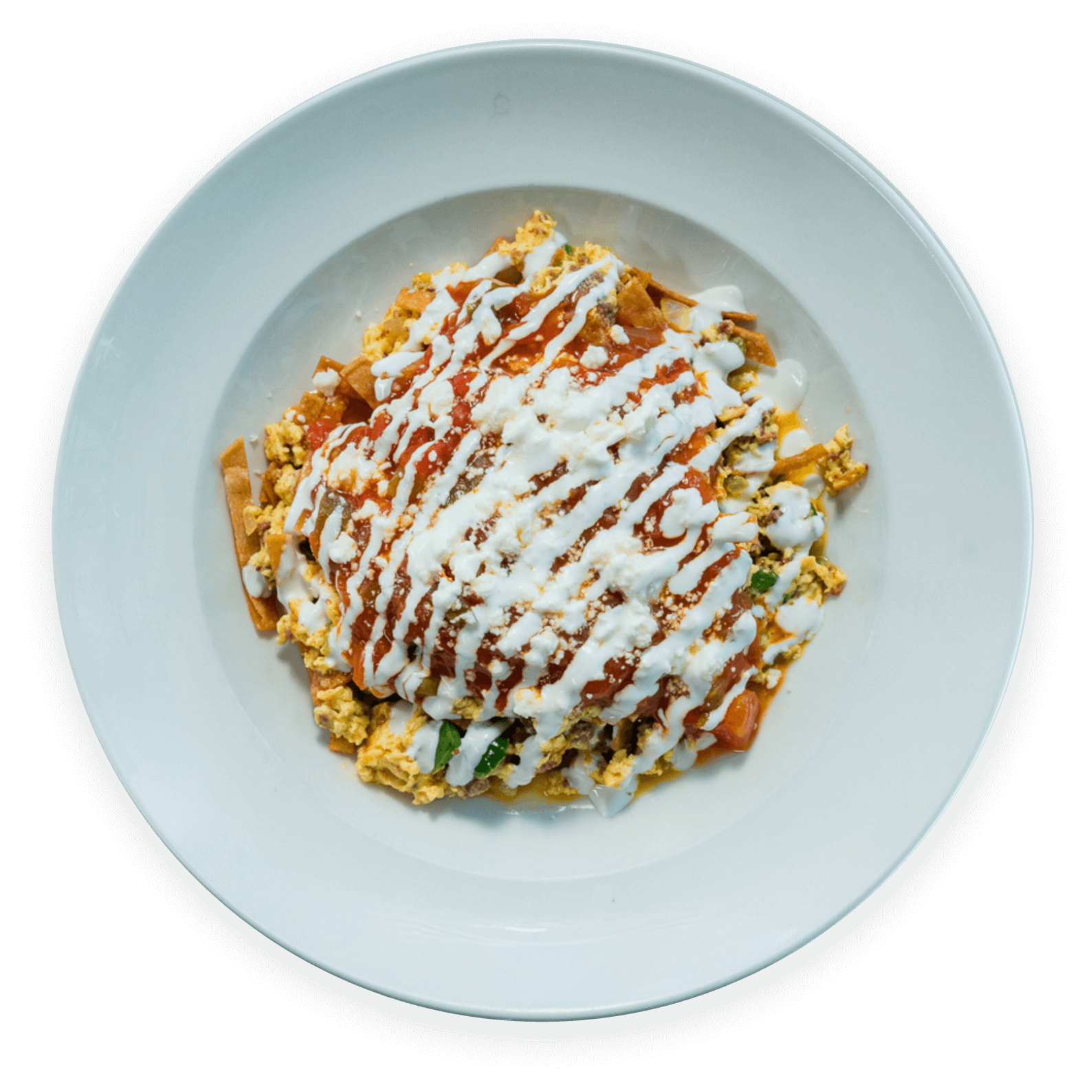 Chilaquiles with eggs, salsa, and crema at Ellen’s Southern Kitchen in Dallas