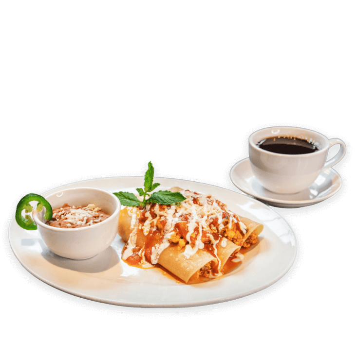 Southern breakfast enchiladas with sauce and crema at Ellen’s Southern Kitchen in Dallas